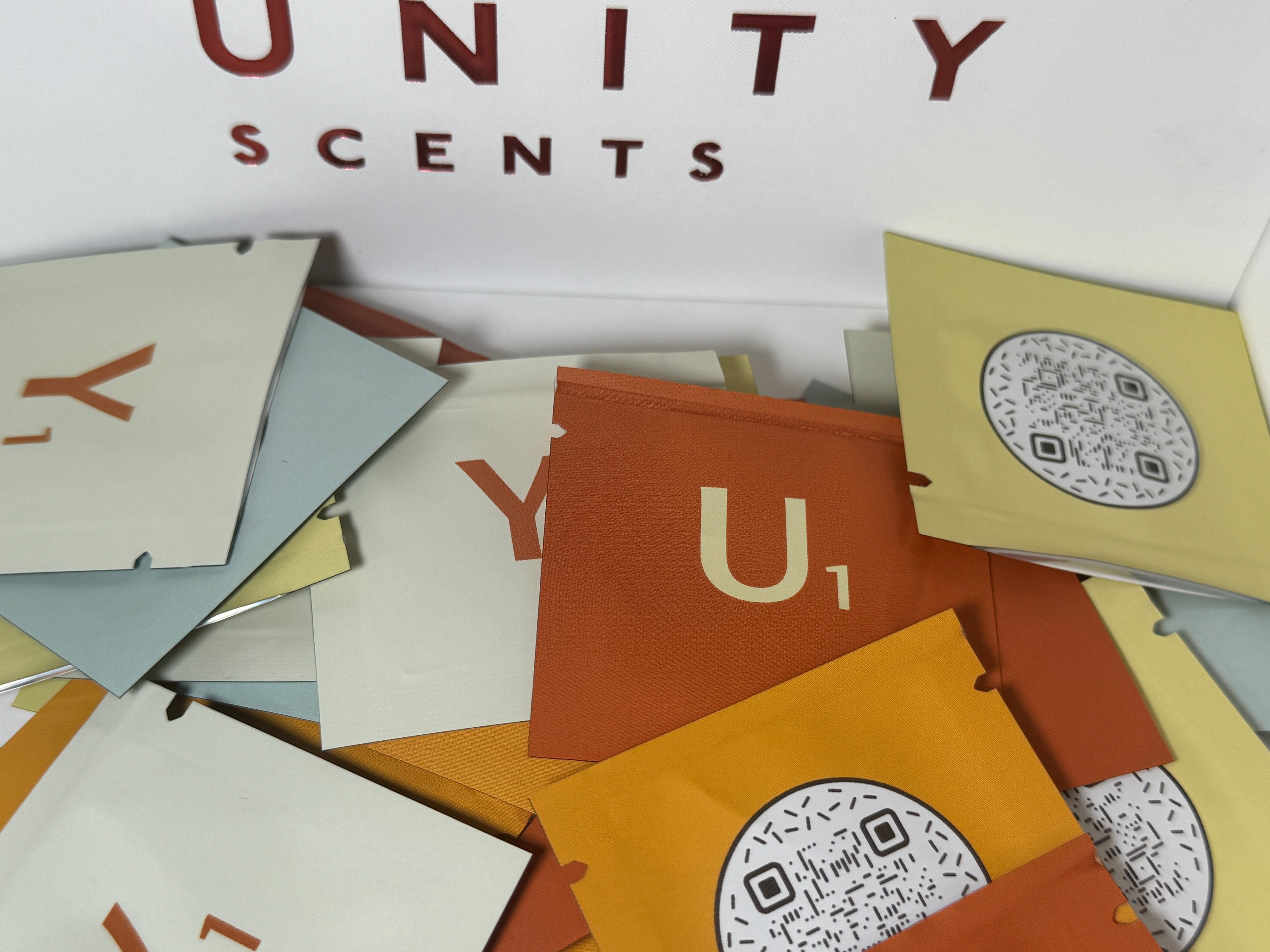 image of a variety of fragrance satchel packs from Unity Scents Season one
